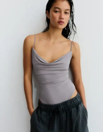 Bodysuit met bandjes en drapering