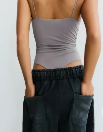 Bodysuit met bandjes en drapering