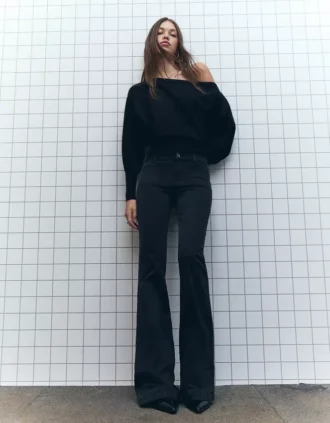 Broek met uitlopende pijpen en zakflappen – Broek