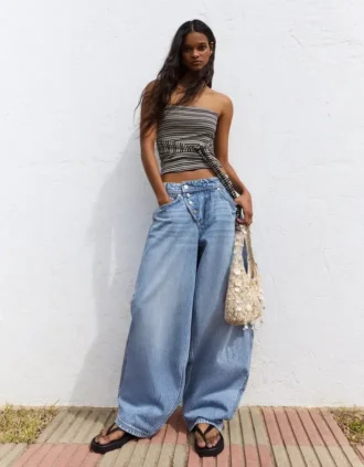 Laaggetailleerde Wide Leg Jeans met knopen aan de voorkant – Broek