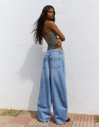 Laaggetailleerde Wide Leg Jeans met knopen aan de voorkant – Broek