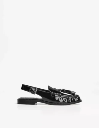 Loafers zonder achterkant met kwastjes
