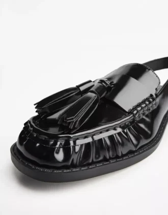 Loafers zonder achterkant met kwastjes